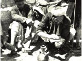 Arabs in Palestine are seen here washing before prayer. The ritual washing of hands was part of the Levitical purification for priests. An early photograph.